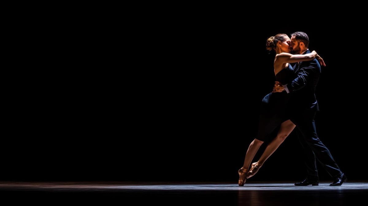 Couple sharing joyful connection while dancing tango
