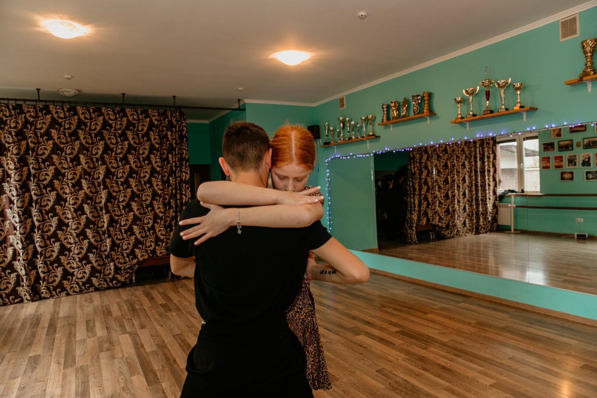 Couple learning tango steps together